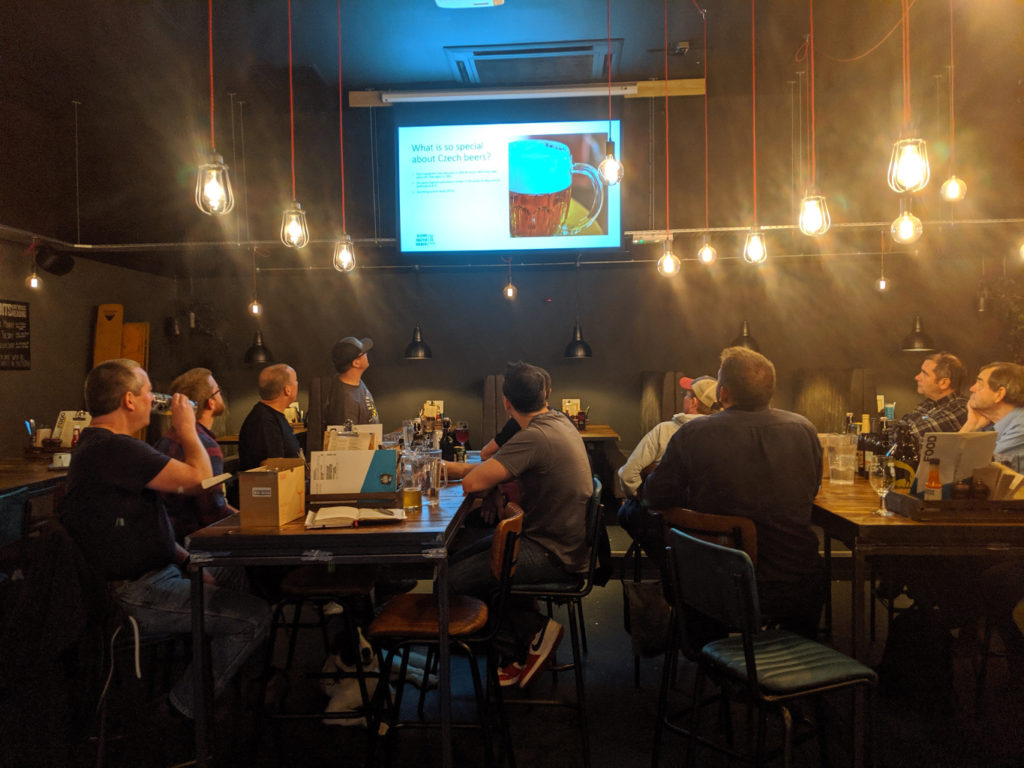 Wide shot of room and projector screen